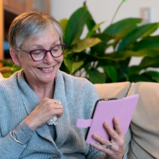 Senior having a telemedicine session with her tablet computer
