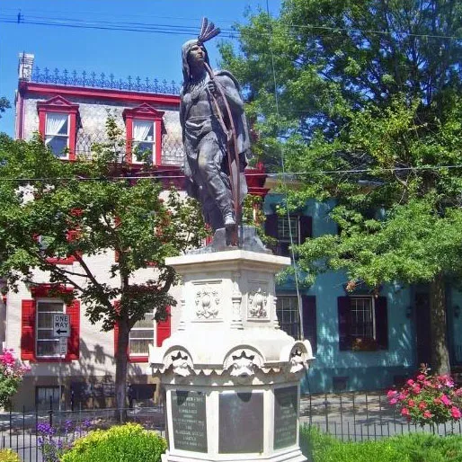 Historic building in the stockade next to statue